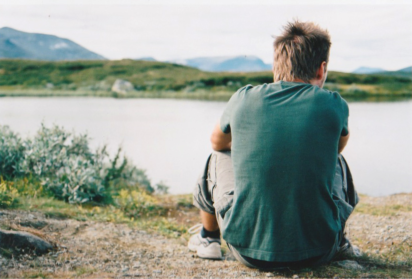 Contemplating mountain lake