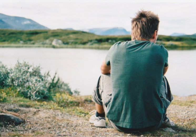 Contemplating mountain lake